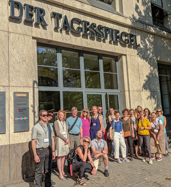 Notre Dame Berlin Seminar Cohort Meeting With Berlin Newspaper Outside Group Shot