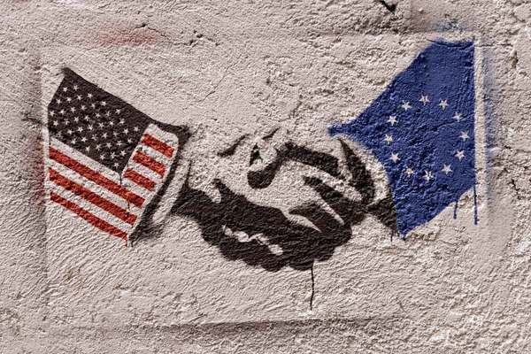 Stencil graffiti representing the agreement of USA and Europe