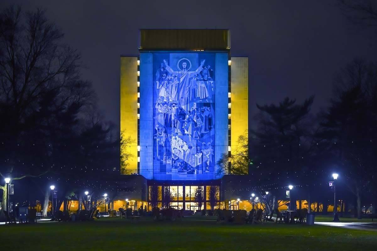 Hesburgh Library at the University of Notre Dame lit in Ukrainian colors.