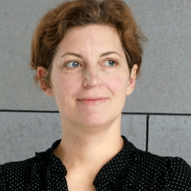 Headshot of Kristina Sliavaite, who is wearing a black blouse.