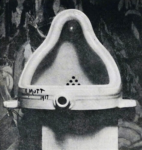 Marcel Duchamp's Fountain, a 1917 white porcelain urinal signed "R. Mutt," resting on a pedestal.